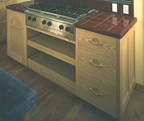 Arts and Crafts kitchen Cooktop cabinet