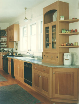 Vertical Grain Fir kitchen row of cabinets