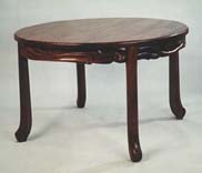 carved walnut round table